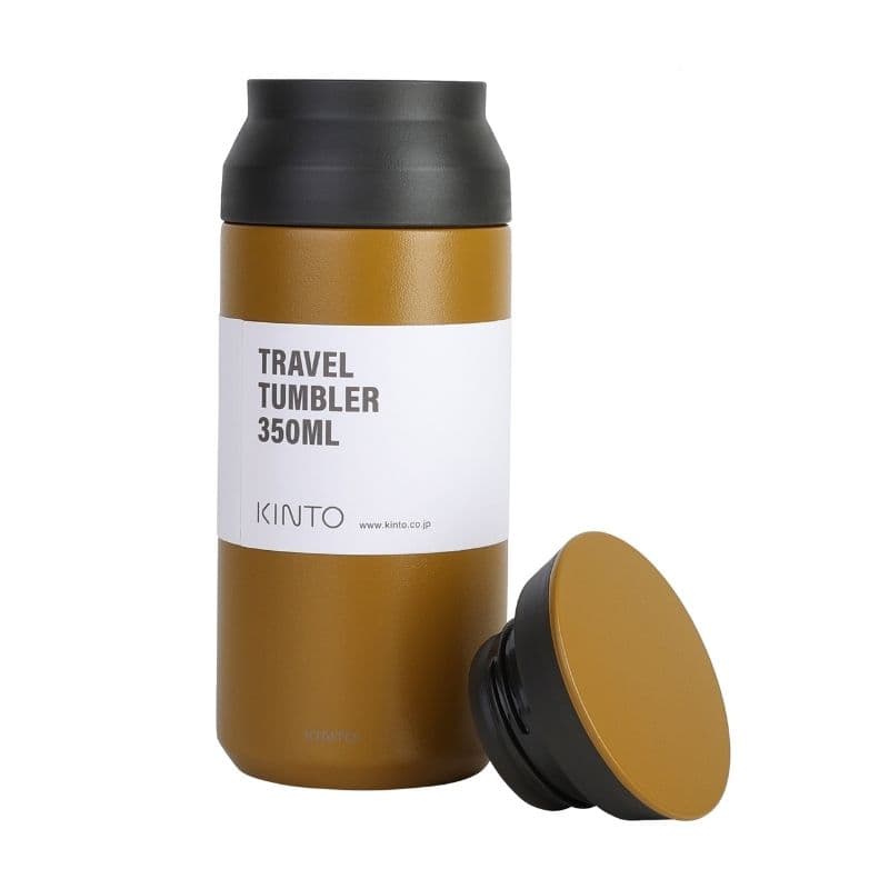 Mustard-yellow travel tumbler with detached lid and a KINTO 350 ml label, on white.