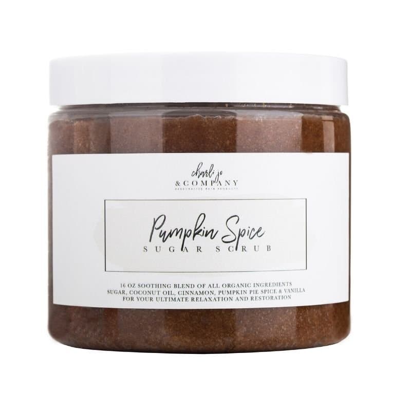 Jar of pumpkin spice sugar scrub with a white lid on a white background.